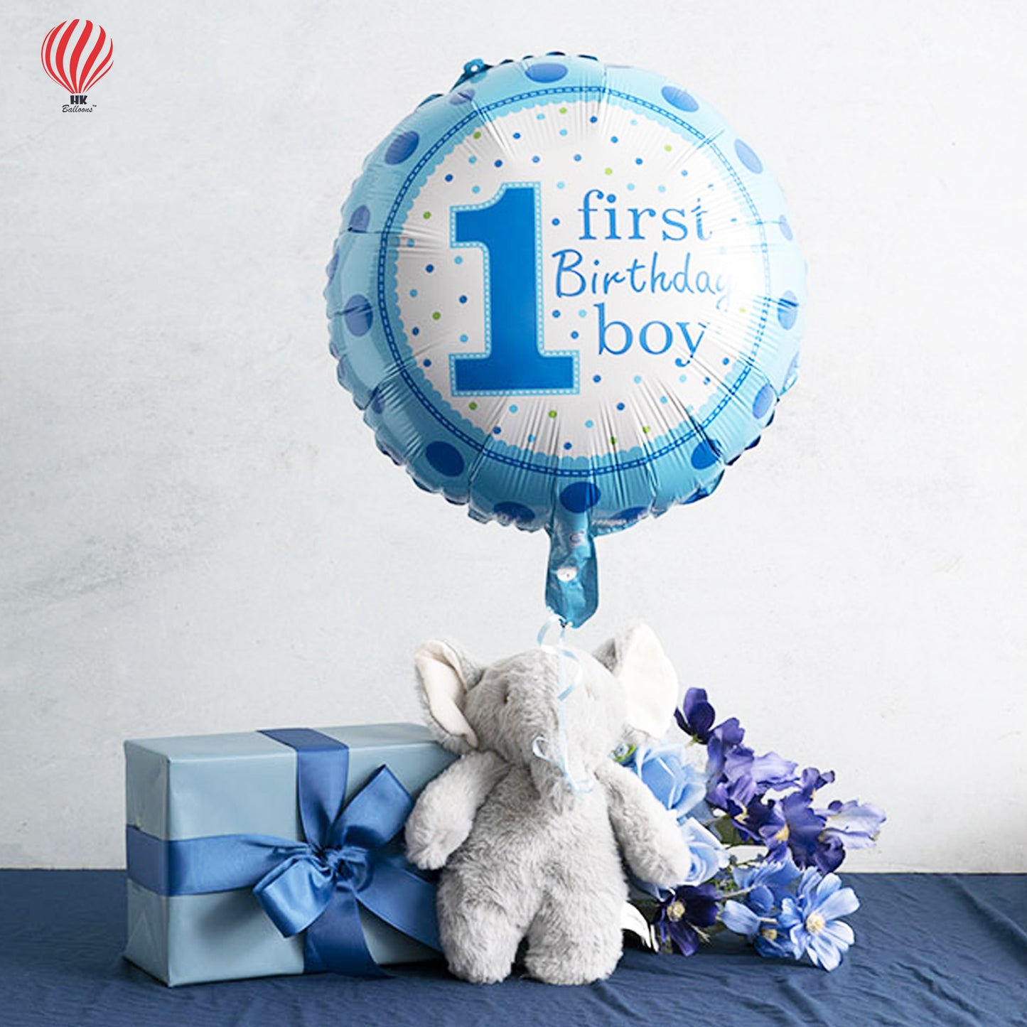 Blue 18-Inch Printed 1st First Birthday Boy Polka Foil Balloon. Ideal for birthdays, baby showers, and event decorations, it adds a delightful touch to your loved one's special day.